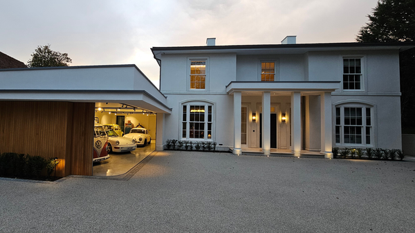 Contemporary architecture for classic home and garage with classic Porsche and Volkswagen's in England